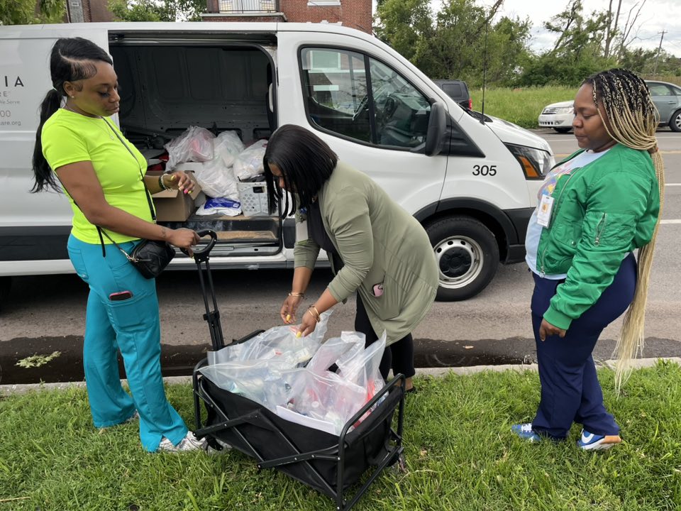 chw, nurses giving out storm supplies