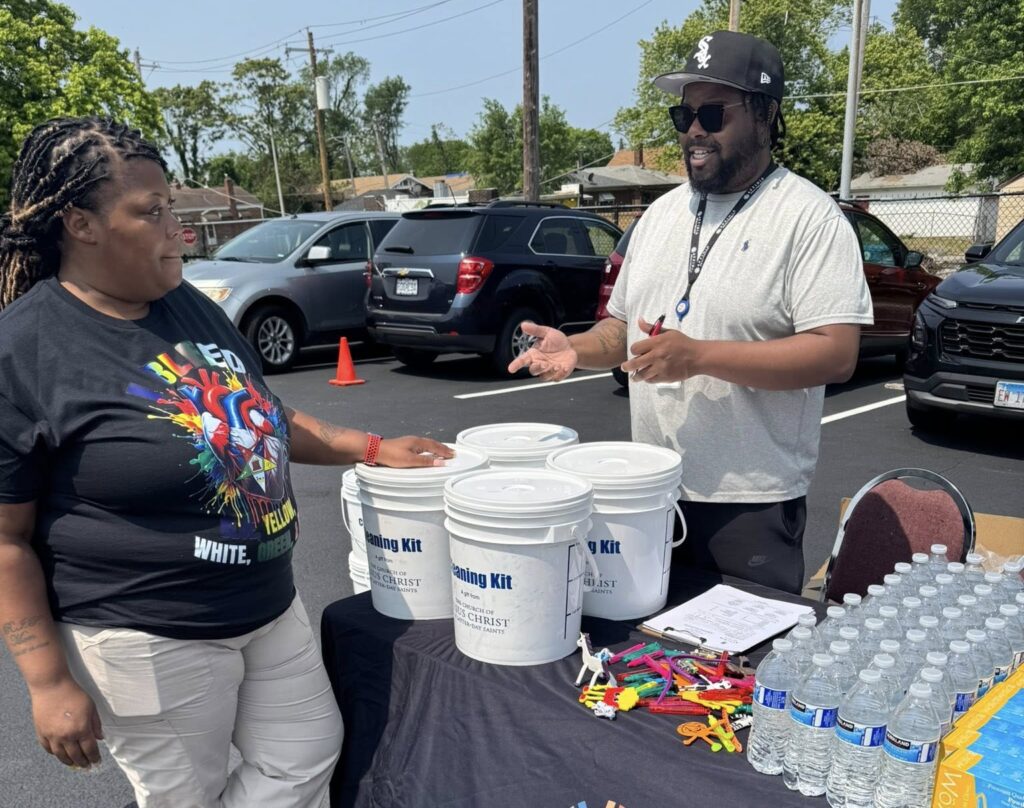 outreach specialist speaks with a member of the community