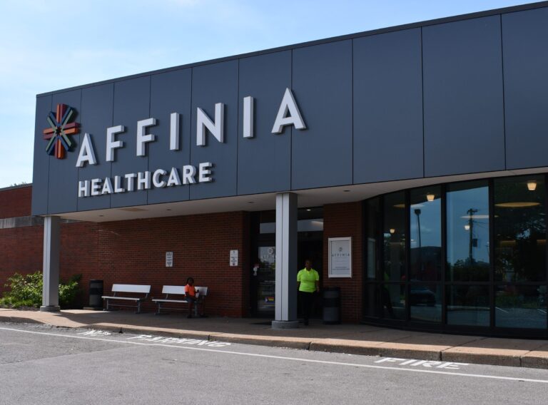 An Affinia Healthcare staff member exits through the renovated entrance at the health center located at 2220 Lemp Avenue in the historic Soulard area. There will be an Open House Monday, September 8 to showcase the recent renovations and improvements.